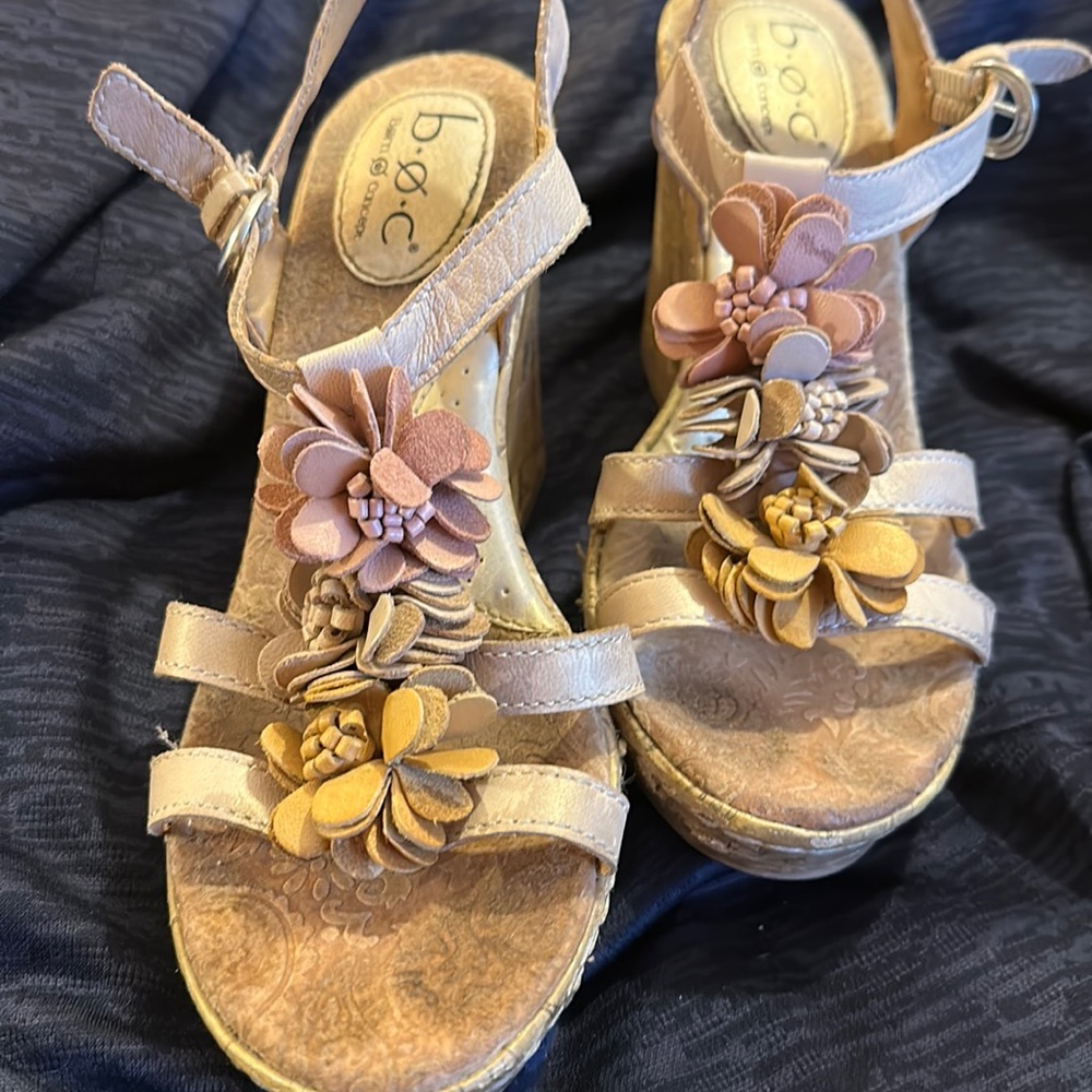 Floral wedge sandals.